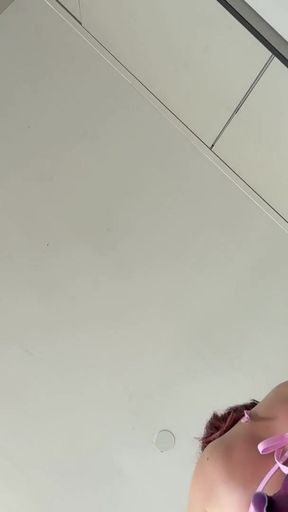 Real college girl in summer house prepares some fruits in the kitchen in the smallest bikini ever with a short skirt   Clip 1