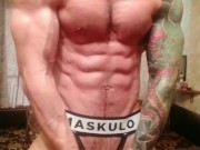Muscle stud posing and jerking big dick