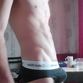 poses beautifully in front of the mirror