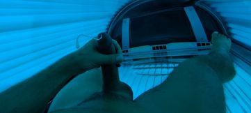 What guys do in a public tanning booth