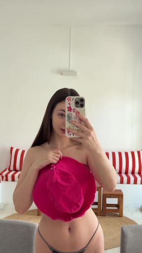 Solitary teen flaunts natural boobs and ass