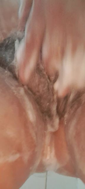 53 year old milf, tits and pussy covered in cream, wet in the shower