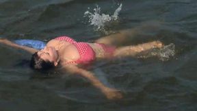 Busty Mother Having Too Much Beach Fun