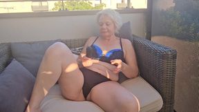 I shift my thong aside and play with my clitoris until I orgasm,  outdoors.