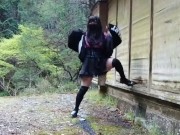 Cute little transgender outdoor exposure services urinating on a mountain