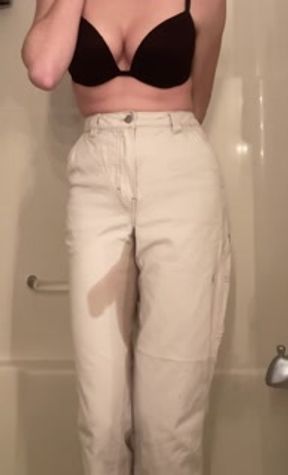Teen girl desperately pisses her white jeans