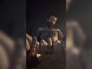 Bearded sissy playing with her love button in underware