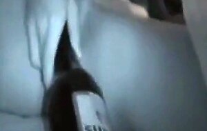 Asian Girl Uses a Bottle to Masturbate