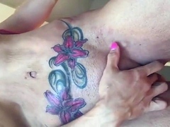 Muscular British MILF with Big Clit and Tattoos