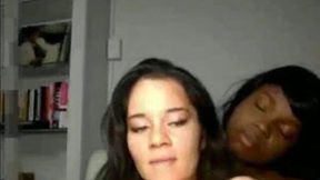Homemade clip with interracial lesbian couple making love
