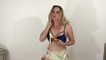 Erin Electra eats a banana