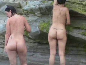 Two curvy Latina chicks expose their big asses on the nude beach