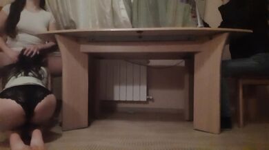 Her cheating girlfriend got me off right under the table while she moaned