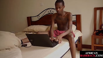 Inked Nubian twink oils up his uncut dick before jerking