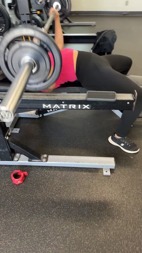 Athletic blonde gym rat gets a workout in while lying solo on the mat