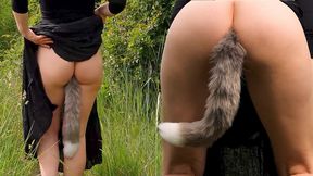 A beautiful Woman strolls in the Forest while carrying a Fox Tail Butt Plug in her Ass