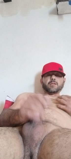 Masturbating