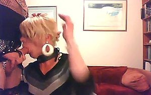 two nice clothed crossdressers in a blowjob-clip