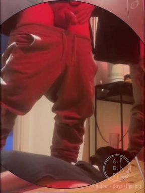 Amateur Boy Pissing in a Glass Held in His Friend's Mouth