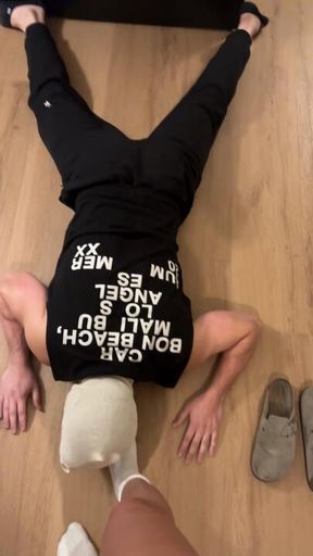 He belongs on the floor kissing my sweaty socks