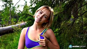 Outdoorsy blonde with perky tits drops her yoga pants and spreads her pussy next to a lake.