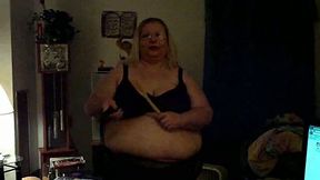 Extremely fat blond granny has fun with ladle and vibrator