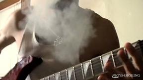 BoysSmoking: Axel Smokes Heavy While Rocking Out And Stroking His Dick