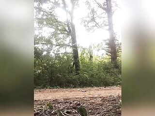 Black tractable spanks her self on public jogging trail