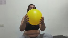 Blowing this Giant Yellow Balloon Until It Pops