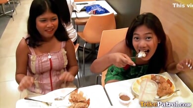 Two Asian brunettes take turns on a cock in a hot POV threesome