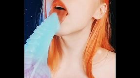 Redhead girl plays with her pussy with a big cock