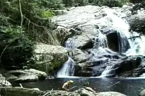 Vintage video of two hot guys having sex near river