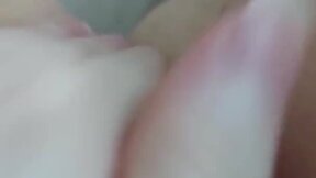 A redheaded hottie is masturbating before she went to bed.