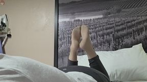 Tan pantyhose and yoga pants tease.