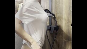 Wet t-shirt babe under the shower