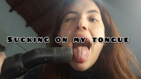 Sucking on every part of my tongue