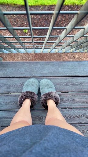 Fuzzy slippers and long legs for a relaxing Monday afternoon