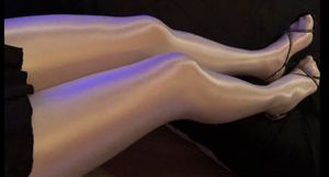 Showing my long hot legs on shiny spandex tights and hot  high heeled sandals.