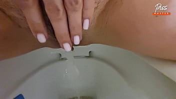 Milf slut pissing and fingering in outdoor POV