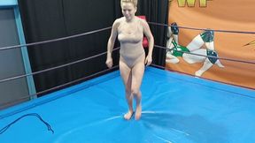 A female football player in skin color bodysuit wrestles and ties up a guy