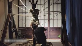 ly99-The girl was tied to a net made of rope.