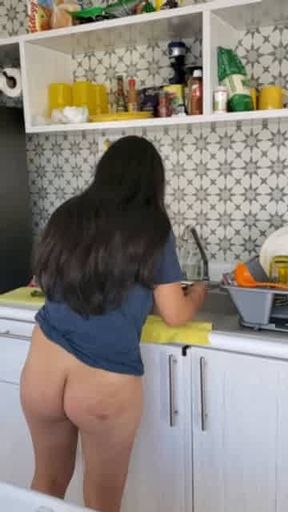 Nudist Daniela Duran showing hairy pussy while cooking