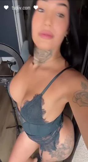 Hot trans in a sexy dress masturbating herself