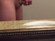 Solo jack off in bathroom mirror side view with cum