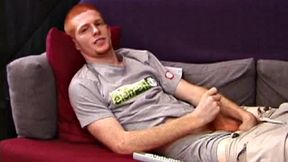 Redheaded Tristian hasn't gotten off in three days, so he is anxious to beat off. Within seconds this cute guy is naked, stroking his dick, and gyrating around on the couch.