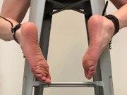 Ankles shackled