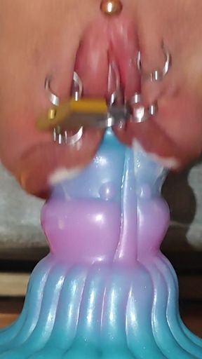 Pumped pierced pussy rides dildo despite lock   Clip 1