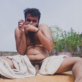 Ismaatdeva has playing with her hairy cock after body bath on terrace
