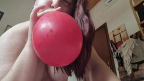 nicoletta s joyful playful adventure with a big red balloon inside her cozy italian home