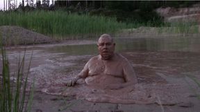 Mud bath in deep quarry mud pond